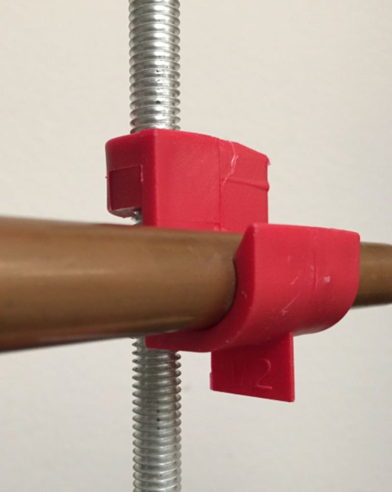 Add-A-Hanger on all thread rod with a copper tube resting in the hanger.  Click on photo for pdf download about Add-A-Hangers. 